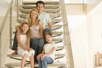 Royalty Free Photo of a Family on a Staircase