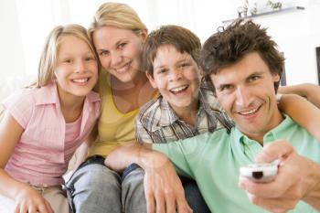 Royalty Free Photo of a Family Watching TV
