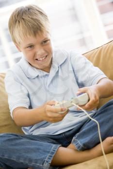 Royalty Free Photo of a Boy Playing Video Games