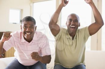 Royalty Free Photo of Two Men Cheering