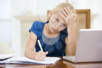 Royalty Free Photo of a Young Girl Doing Homework