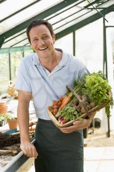 Royalty Free Photo of a Man With Vegetables