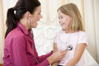 Royalty Free Photo of a Doctor With a Little Girl
