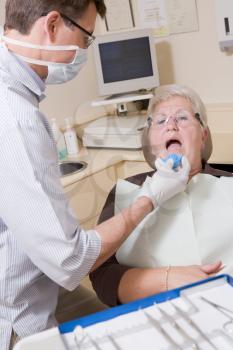 Royalty Free Photo of a Dentist and Patient