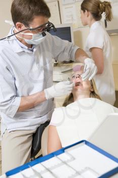 Royalty Free Photo of a Dental Procedure