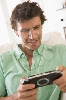 Royalty Free Photo of a Man With a Video Game