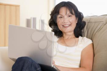 Royalty Free Photo of a Woman Using a Laptop