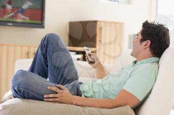 Royalty Free Photo of a Man Watching Television