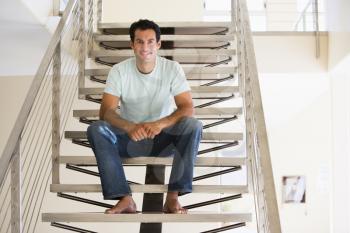 Royalty Free Photo of a Man on a Staircase