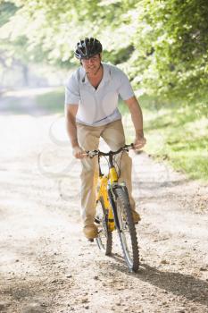 Royalty Free Photo of a Guy on a Bike