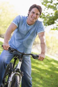 Royalty Free Photo of a Man on a Bike