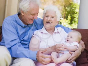 Royalty Free Photo of Grandparents With a Baby