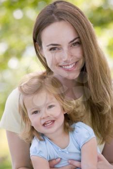 Royalty Free Photo of a Mother Holding a Daughter