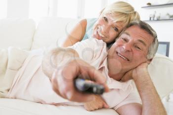 Royalty Free Photo of a Couple With a Remote Control