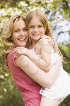 Royalty Free Photo of a Mother and Daughter outside