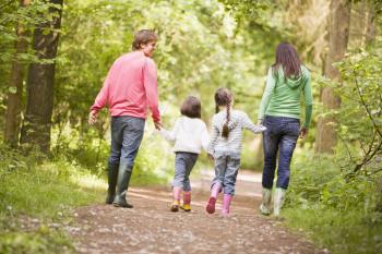 Royalty Free Photo of a Family on a Country Trail