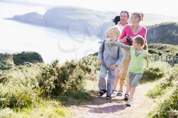 Royalty Free Photo of a Family Walking on a Cliff