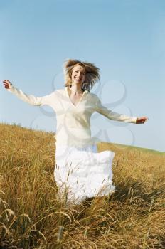 Royalty Free Photo of a Woman Running in the Country