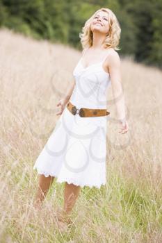 Royalty Free Photo of a Woman in a Field