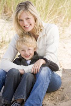 Royalty Free Photo of a Mother and Son at the Beach