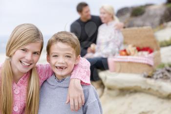 Royalty Free Photo of a Family Having a Picnic at the Beach