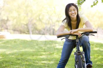 Royalty Free Photo of a Woman on a Bike