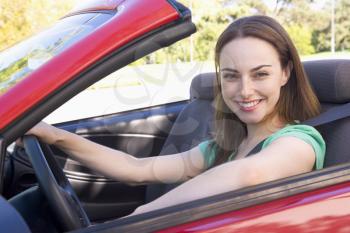 Royalty Free Photo of a Woman in a Convertible