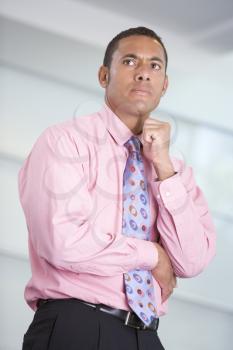 Royalty Free Photo of a Man in a Pink Shirt