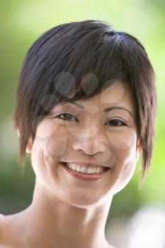 Royalty Free Photo of a Smiling Asian Woman