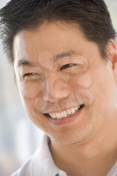 Royalty Free Photo of a Smiling Asian Man