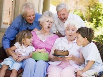 Royalty Free Photo of Grandparents and Grandchildren Celebrating a Birthday