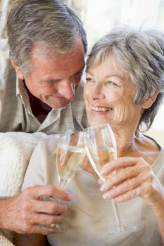 Royalty Free Photo of a Couple With Champagne