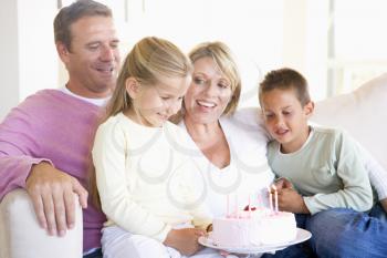Royalty Free Photo of a Family With a Cake