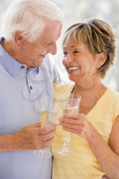 Royalty Free Photo of a Couple With Champagne