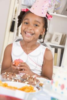 Royalty Free Photo of a Little Girl at a Birthday Party