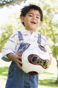 Royalty Free Photo of a Little Boy With a Soccer Ball