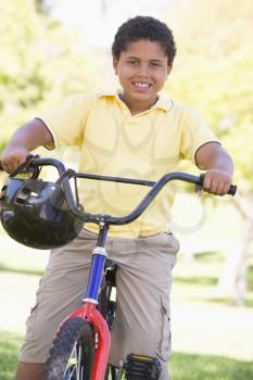Royalty Free Photo of a Boy on a Bike