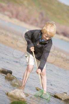Royalty Free Photo of a Boy at the Beach