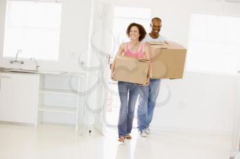 Royalty Free Photo of a Couple Moving In