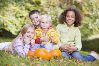 Royalty Free Photo of Children With Pumpkins