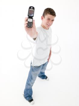 Royalty Free Photo of a Teenage Boy With a Cellphone