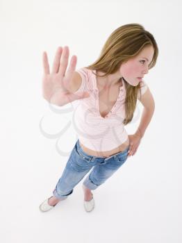 Royalty Free Photo of a Teenage Girl With Her Hand Out