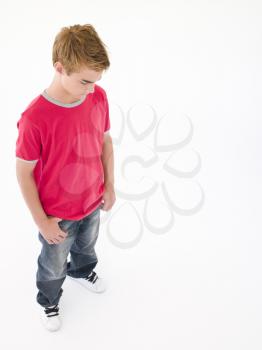 Royalty Free Photo of a Boy Looking Down