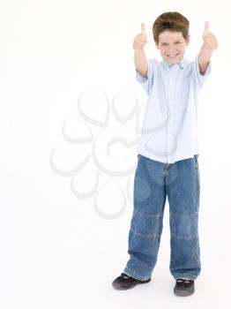Royalty Free Photo of a Boy Giving a Thumbs Up