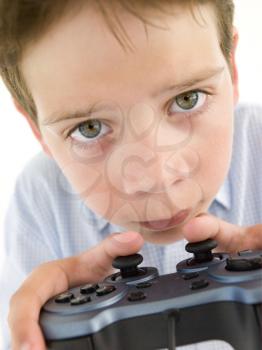 Royalty Free Photo of a Boy With a Game Controller