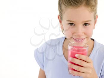 Royalty Free Photo of a Girl With a Glass of Juice
