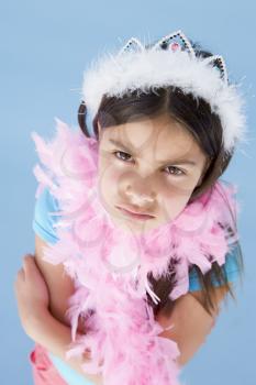 Royalty Free Photo of a Girl in a Feathered Crown and Boa