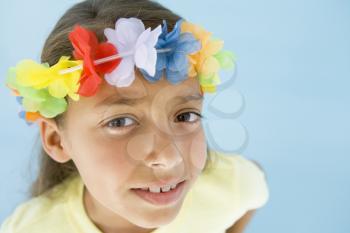Royalty Free Photo of a Girl With a Garland on Her Head