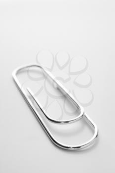 Royalty Free Photo of a Closeup of a Silver Paperclip
