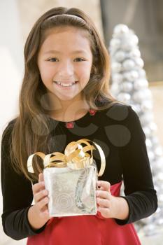 Royalty Free Photo of a Girl With a Gift